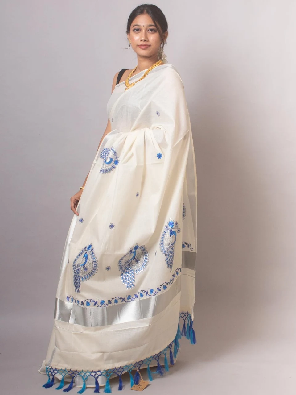 Silver Zari Kerala Kasavu Cotton Saree with Blue Peacock Motif Embroidery